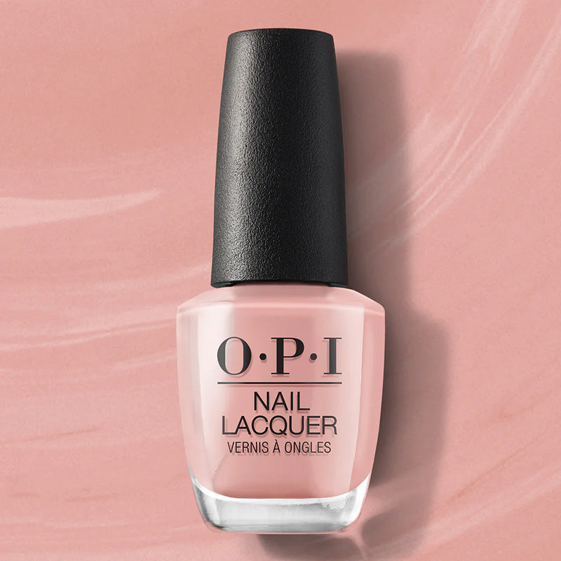 OPI nail polish bottle on a pink background