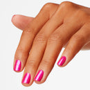 Hand with pink nail polish on a white background