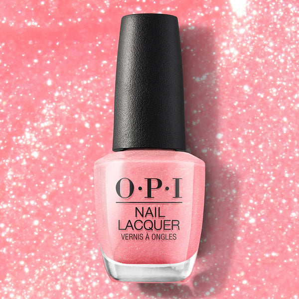 OPI nail polish bottle on a pink glittery background