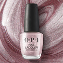 OPI nail polish bottle on a glittery pink and silver background