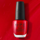 Red OPI nail polish bottle on a red background
