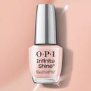 OPI Infinite Shine nail polish bottle on a pink background
