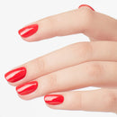 Hand with red nail polish on a white background