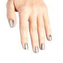 Hand with silver nail polish on a white background