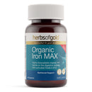 A bottle of Herbs of Gold Organic Iron MAX dietary supplement, featuring a dark amber brown bottle, a white ribbed cap, and a label with blue, teal, and white sections.