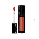 Revlon lipstick with applicator and packaging on a white background