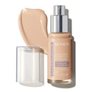 Revlon Illuminance foundation bottle with applicator on a white background