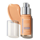 Revlon Illuminage foundation bottle with applicator on a white background
