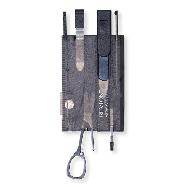 A Revlon men's grooming multi-tool kit, featuring a slim, credit-card-size case with various grooming tools including scissors, tweezers, a nail file, and a plastic toothpick. Additional tools such as an LED light, ruler, knife, and pen are visible outside the case.