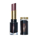 Revlon lipstick with gold cap and black body on a white background