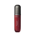Revlon lipstick with red body and silver cap on a white background
