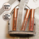 Three lip balm tubes in a decorative case with product details on vitamins and pigments.