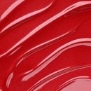 Close-up of red paint with white brush strokes
