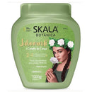 Skala Botánica hair care product jar with a woman holding flowers on a white background