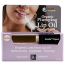Soodox Organic plumping lip oil packaging with a woman applying the product.