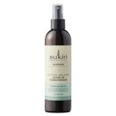 Sukin haircare leave-in conditioner bottle on a white background