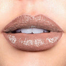 Close-up of lips with a glossy, metallic lip color