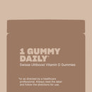 Container of Swisse Ultiboost Vitamin D Gummies on a beige background
