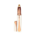 Cosmetic pencil with rose gold accents on a white background