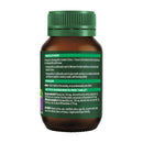 An amber brown bottle of Agni Shankar Complex Stress tablets with a green ribbed cap, showing the back label with text details on a white background.