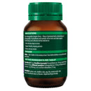Brown supplement bottle with green label on a white background