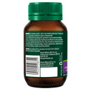 Back view of a brown supplement bottle with a green cap, showing the warning label and barcode on a white background.