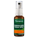 Thompson's Manuka Sore Throat Spray in a 25 ml amber glass bottle with a white spray pump and a green and orange label.