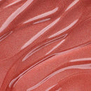 Close-up of a textured red fabric with white abstract patterns