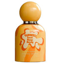 A 100ml bottle of Tubbees Sweet Mango Melody Eau de Parfum, featuring a glossy round yellow cap and a matching yellow body with orange and white abstract designs.