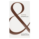 Santal & Vanilla perfume packaging with a large brown ampersand on a white background