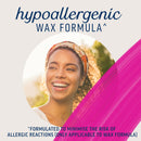 Advertisement for a hypoallergenic wax formula with a smiling woman and pink accent.