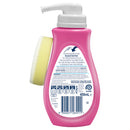 Pink bottle with pump and yellow scrubber on a white background