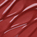 Close-up of red fabric with white abstract patterns