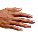 Hand with purple nail polish on a white background