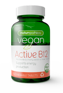 A bottle of Naturopathica Vegan Active B12 chewable tablets with 60 tablets, supporting energy production. The label is green and white with text and a vegan logo.