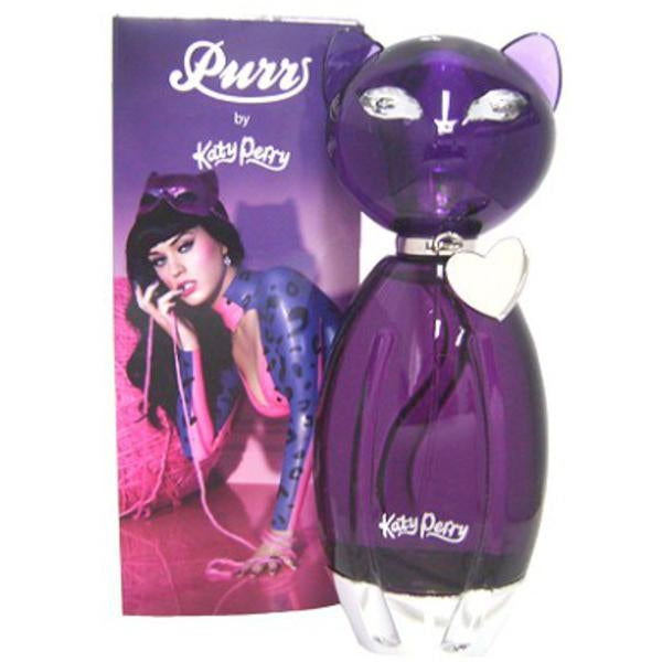 A bottle of Katy Perry Purr eau de parfum, featuring a metallic purple color and designed in the shape of a cat with a jewel-like collar. The bottle is accompanied by an image of Katy Perry in a pink and purple latex cat suit.