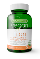 A green container of Naturopathica Vegan Iron Plus Vitamin C & Broccoli Powder with 30 hard capsules, labeled as vegan and gluten-free.