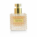A bottle of Valentino Donna 50ml Eau de Parfum with a clear textured design and a gold cap.